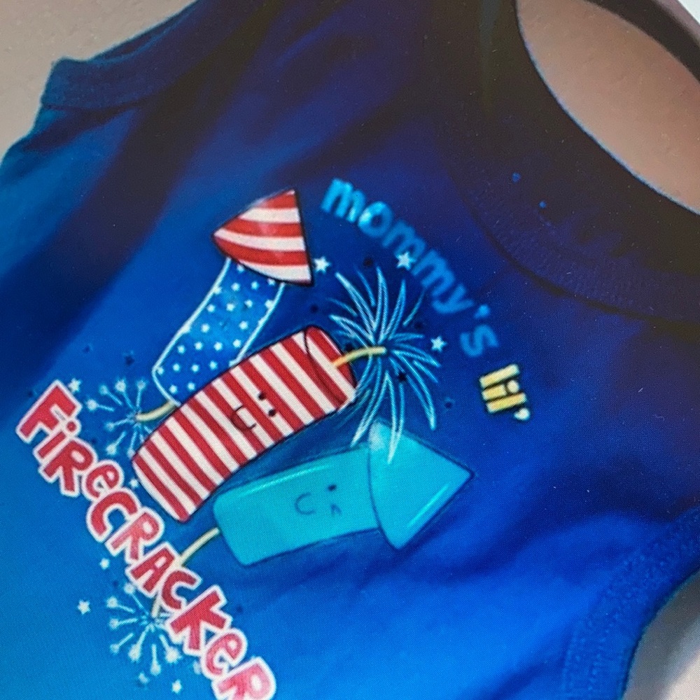 Graphics and baby’s firecracker design top
